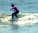 Dan surfing.